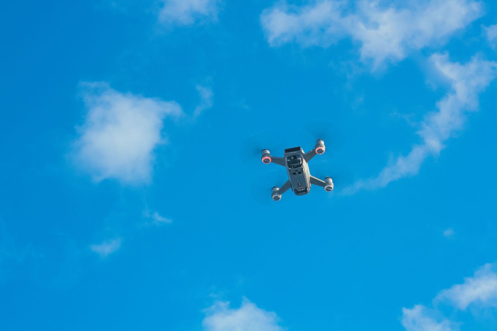 Commercial drone flying against the sky