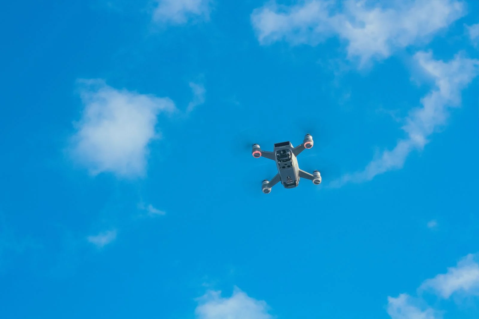 Commercial drone flying against the sky