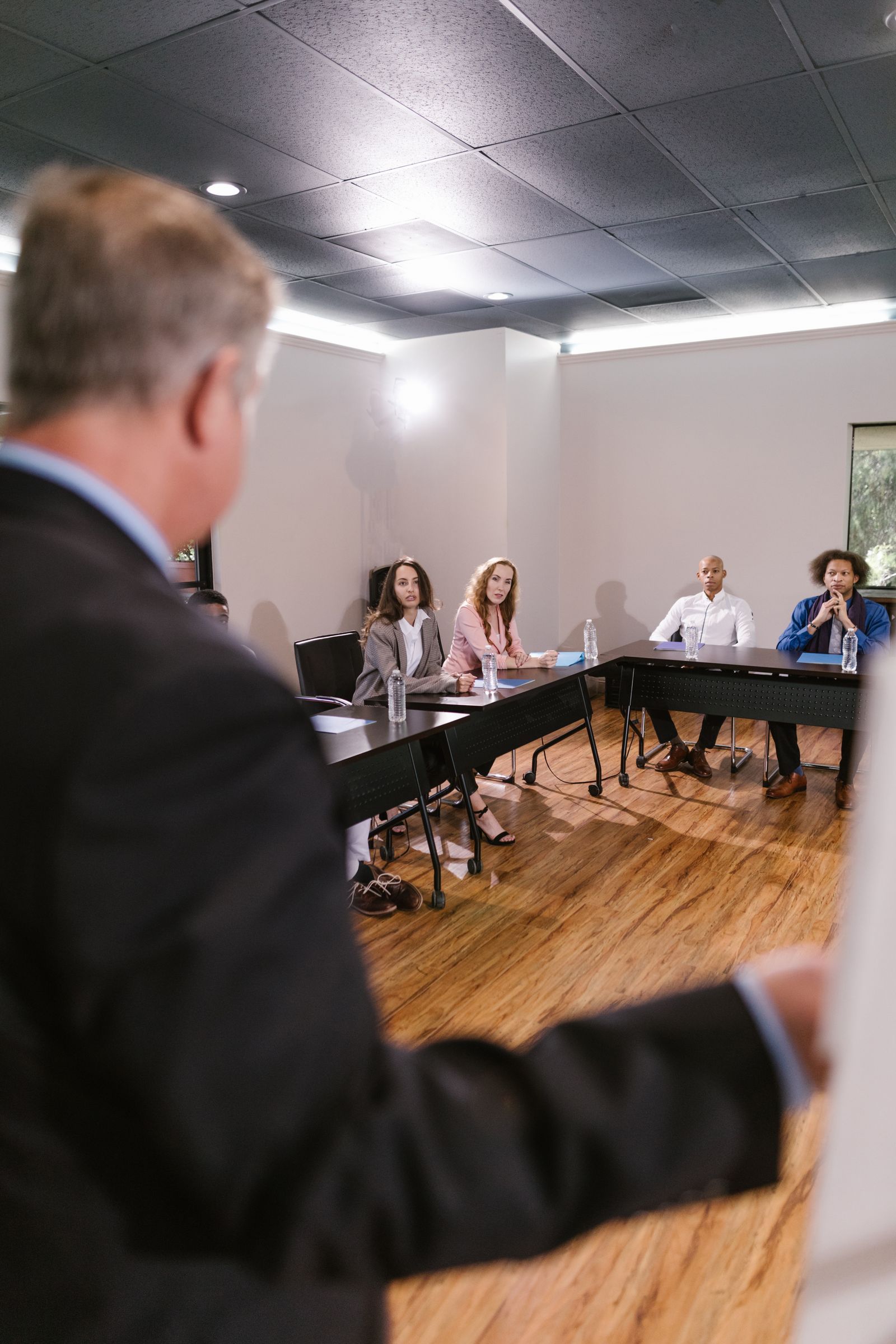 Executive team reviewing a RAG status report in a boardroom