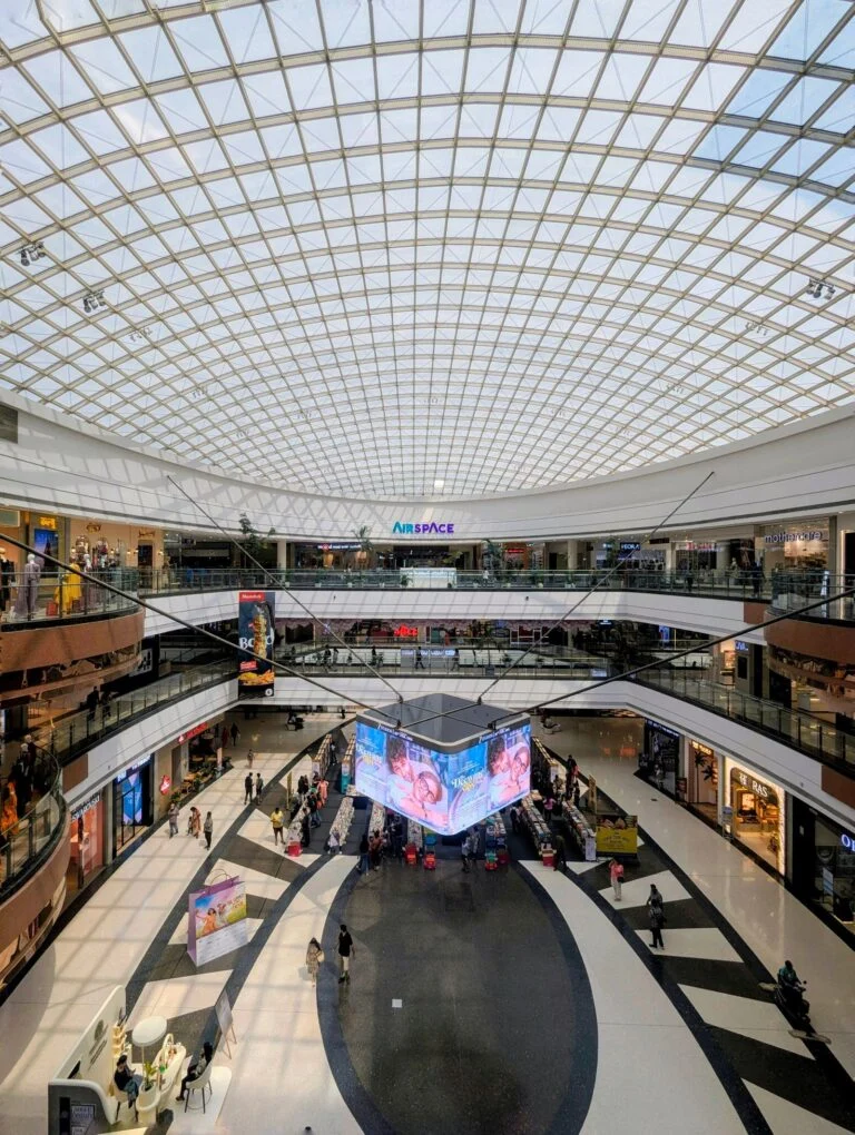 Digital signage screens across a modern multi-site retail environment