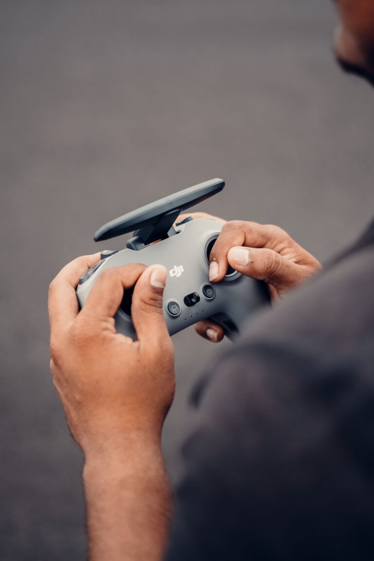 Drone pilot holding a controller preparing a commercial flight in Greece