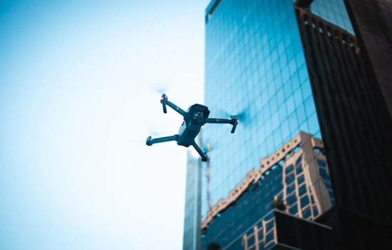 Drone in flight over an urban environment under EASA Specific category rules