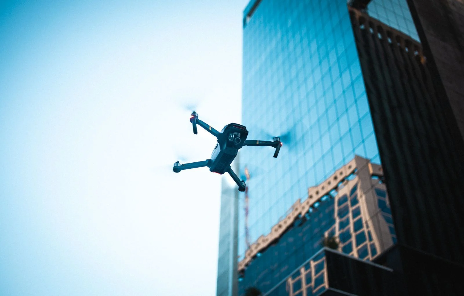 Drone in flight over an urban environment under EASA Specific category rules